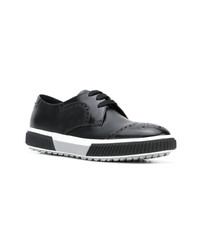 Chaussures brogues en cuir noires Prada