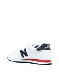 Chaussures de sport blanc et bleu marine New Balance