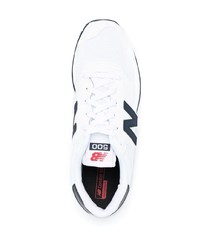 Chaussures de sport blanc et bleu marine New Balance