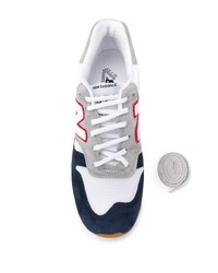 Chaussures de sport blanc et bleu marine New Balance