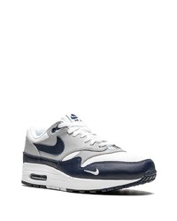 Chaussures de sport blanc et bleu marine Nike