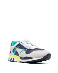 Chaussures de sport blanc et bleu marine Puma