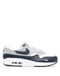 Chaussures de sport blanc et bleu marine Nike