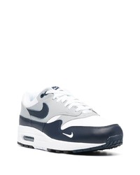 Chaussures de sport blanc et bleu marine Nike