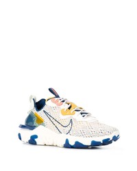 Chaussures de sport blanc et bleu Nike