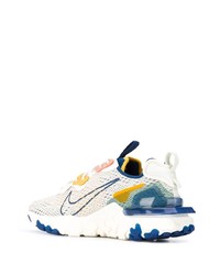 Chaussures de sport blanc et bleu Nike