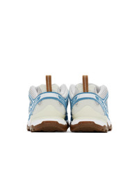 Chaussures de sport blanc et bleu Salomon