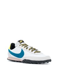 Chaussures de sport blanc et bleu Nike