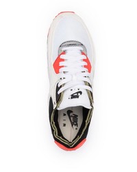 Chaussures de sport blanc et rose Nike