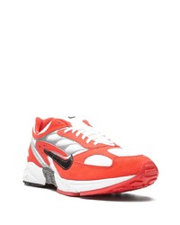 Chaussures de sport blanc et rouge Nike