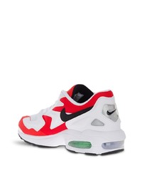 Chaussures de sport blanc et rouge Nike