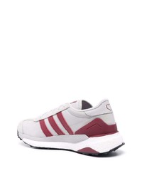 Chaussures de sport blanc et rouge adidas