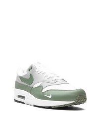 Chaussures de sport blanc et vert Nike