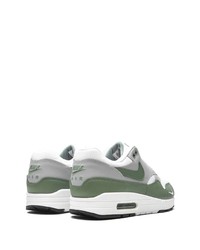 Chaussures de sport blanc et vert Nike