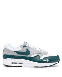 Chaussures de sport blanc et vert Nike