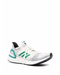 Chaussures de sport blanc et vert adidas