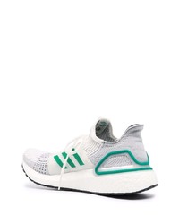 Chaussures de sport blanc et vert adidas