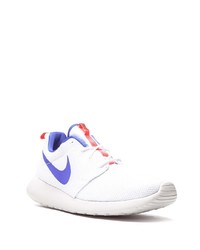 Chaussures de sport blanc et violet Nike