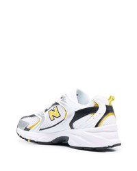 Chaussures de sport blanches et noires New Balance