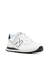 Chaussures de sport blanches et noires New Balance