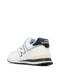 Chaussures de sport blanches et noires New Balance