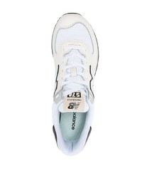 Chaussures de sport blanches et noires New Balance