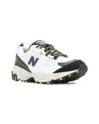 Chaussures de sport blanches et noires New Balance