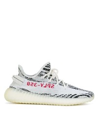 Chaussures de sport blanches et noires adidas YEEZY