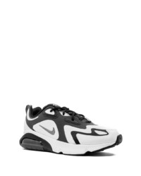 Chaussures de sport blanches et noires Nike