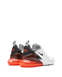 Chaussures de sport blanches et noires Nike