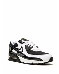 Chaussures de sport blanches et noires Nike