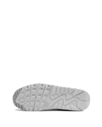 Chaussures de sport blanches et noires Nike