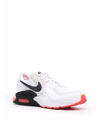 Chaussures de sport blanches et noires Nike