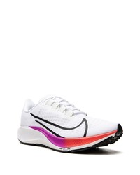 Chaussures de sport blanches et noires Nike