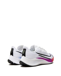 Chaussures de sport blanches et noires Nike