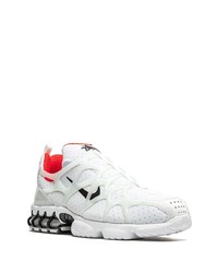 Chaussures de sport blanches et noires Nike