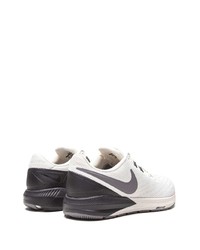 Chaussures de sport blanches et noires Nike