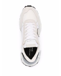 Chaussures de sport blanches et noires Philippe Model Paris