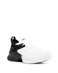 Chaussures de sport blanches et noires APL Athletic Propulsion Labs