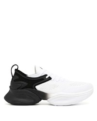 Chaussures de sport blanches et noires APL Athletic Propulsion Labs
