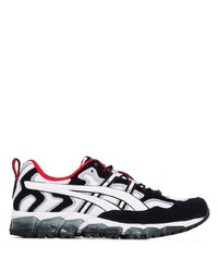 Chaussures de sport blanches et noires Asics