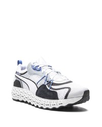 Chaussures de sport blanches et noires Puma