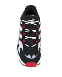 Chaussures de sport blanches et noires Puma