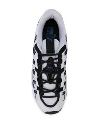 Chaussures de sport blanches et noires Puma