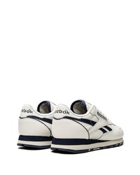 Chaussures de sport blanches et noires Reebok