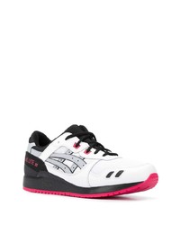 Chaussures de sport blanches et noires Asics