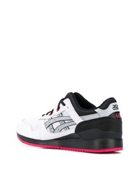 Chaussures de sport blanches et noires Asics