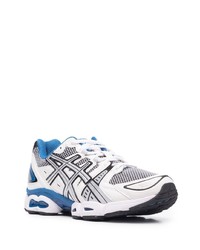 Chaussures de sport blanches et noires Asics