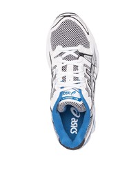 Chaussures de sport blanches et noires Asics