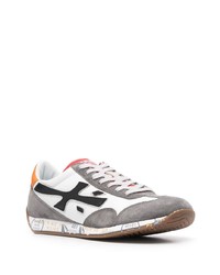 Chaussures de sport blanches et noires Premiata